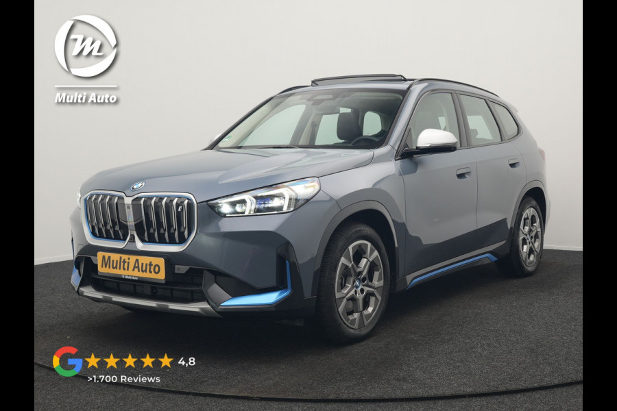 BMW iX1 xDrive30 Launch Edition 313pk Dealer O.H | Panodak | Adaptive Cruise | 360 Camera | Lederen Comfortzetels Massage & Memory | Head Up | Harman Kardon | Keyless |