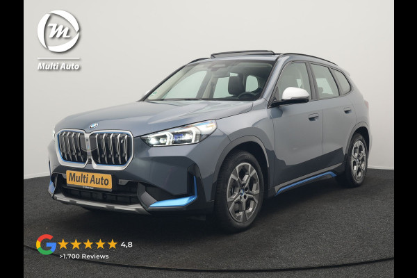BMW iX1 xDrive30 Launch Edition 313pk Dealer O.H | Panodak | Adaptive Cruise | 360 Camera | Lederen Comfortzetels Massage & Memory | Head Up | Harman Kardon | Keyless |
