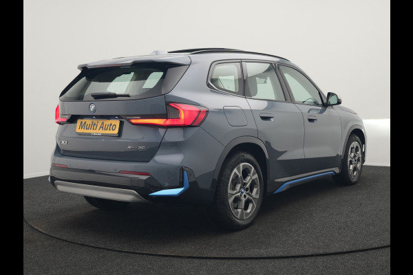 BMW iX1 xDrive30 Launch Edition 313pk Dealer O.H | Panodak | Adaptive Cruise | 360 Camera | Lederen Comfortzetels Massage & Memory | Head Up | Harman Kardon | Keyless |