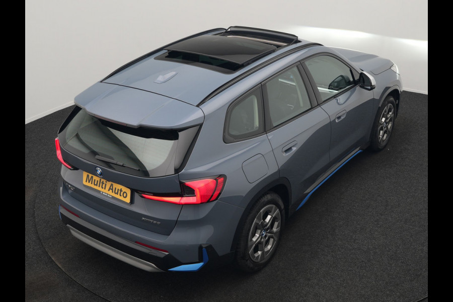 BMW iX1 xDrive30 Launch Edition 313pk Dealer O.H | Panodak | Adaptive Cruise | 360 Camera | Lederen Comfortzetels Massage & Memory | Head Up | Harman Kardon | Keyless |