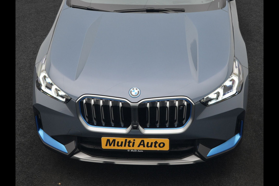 BMW iX1 xDrive30 Launch Edition 313pk Dealer O.H | Panodak | Adaptive Cruise | 360 Camera | Lederen Comfortzetels Massage & Memory | Head Up | Harman Kardon | Keyless |