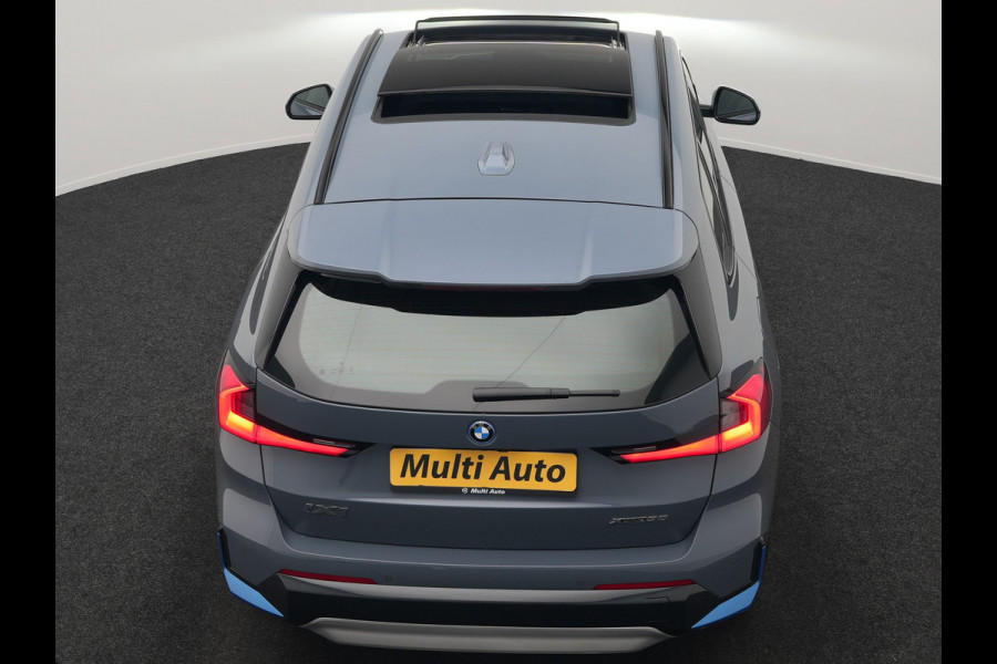 BMW iX1 xDrive30 Launch Edition 313pk Dealer O.H | Panodak | Adaptive Cruise | 360 Camera | Lederen Comfortzetels Massage & Memory | Head Up | Harman Kardon | Keyless |