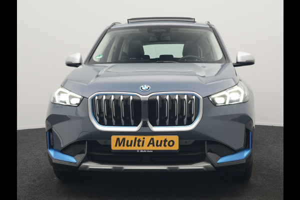 BMW iX1 xDrive30 Launch Edition 313pk Dealer O.H | Panodak | Adaptive Cruise | 360 Camera | Lederen Comfortzetels Massage & Memory | Head Up | Harman Kardon | Keyless |