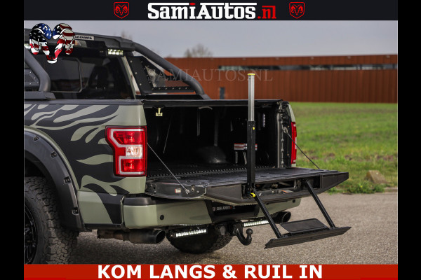 Dodge Ram FORD F150 5.0 V8 4X4 | MAT OLIVE GREEN | BIJTELLING VRIJ | ZEER DIK | CAMERA | 3500KG | PANORAMA | LEDER | GO RHINO ROLLBAR | CRUISE CONTROL | PRINS LPG | BAKFLIP COVER | Deze pick-up is leverbaar met zowel een groot rijbewijs (C) als een klein rijbewijs (B). Laat ons weten wat jouw voorkeur is.