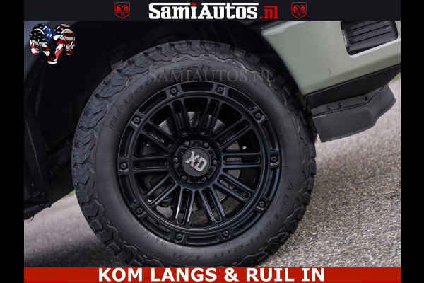 Dodge Ram FORD F150 5.0 V8 4X4 | MAT OLIVE GREEN | BIJTELLING VRIJ | ZEER DIK | CAMERA | 3500KG | PANORAMA | LEDER | GO RHINO ROLLBAR | CRUISE CONTROL | PRINS LPG | BAKFLIP COVER | Deze pick-up is leverbaar met zowel een groot rijbewijs (C) als een klein rijbewijs (B). Laat ons weten wat jouw voorkeur is.