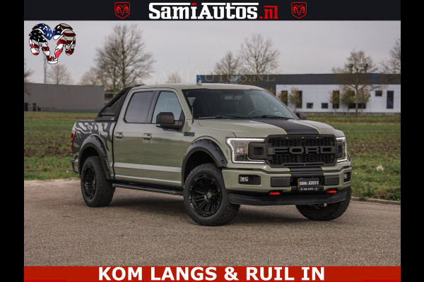 Dodge Ram FORD F150 5.0 V8 4X4 | MAT OLIVE GREEN | BIJTELLING VRIJ | ZEER DIK | CAMERA | 3500KG | PANORAMA | LEDER | GO RHINO ROLLBAR | CRUISE CONTROL | PRINS LPG | BAKFLIP COVER | Deze pick-up is leverbaar met zowel een groot rijbewijs (C) als een klein rijbewijs (B). Laat ons weten wat jouw voorkeur is.