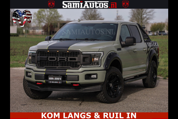 Dodge Ram FORD F150 5.0 V8 4X4 | MAT OLIVE GREEN | BIJTELLING VRIJ | ZEER DIK | CAMERA | 3500KG | PANORAMA | LEDER | GO RHINO ROLLBAR | CRUISE CONTROL | PRINS LPG | BAKFLIP COVER | Deze pick-up is leverbaar met zowel een groot rijbewijs (C) als een klein rijbewijs (B). Laat ons weten wat jouw voorkeur is.