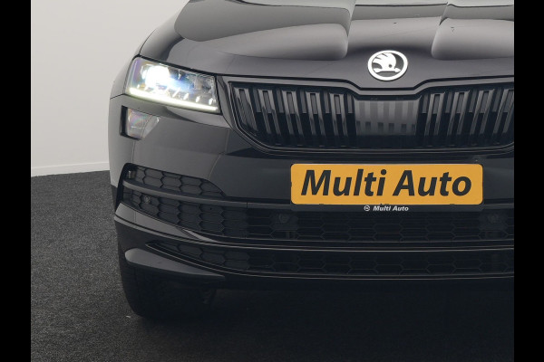 Škoda Karoq 1.5 TSI ACT Sportline 150pk DSG Dealer O.H | Trekhaak Afn. | Panodak | RS Sportstoelen Verwarmd | Adaptive Cruise | Sfeerverlichting | Camera | Apple Carplay | Keyless | Navigatie | DAB | 19" L.M |