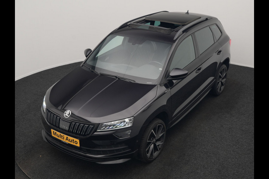 Škoda Karoq 1.5 TSI ACT Sportline 150pk DSG Dealer O.H | Trekhaak Afn. | Panodak | RS Sportstoelen Verwarmd | Adaptive Cruise | Sfeerverlichting | Camera | Apple Carplay | Keyless | Navigatie | DAB | 19" L.M |