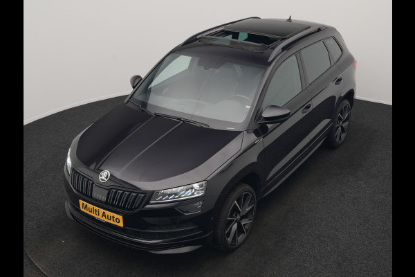 Škoda Karoq 1.5 TSI ACT Sportline 150pk DSG Dealer O.H | Trekhaak Afn. | Panodak | RS Sportstoelen Verwarmd | Adaptive Cruise | Sfeerverlichting | Camera | Apple Carplay | Keyless | Navigatie | DAB | 19" L.M |