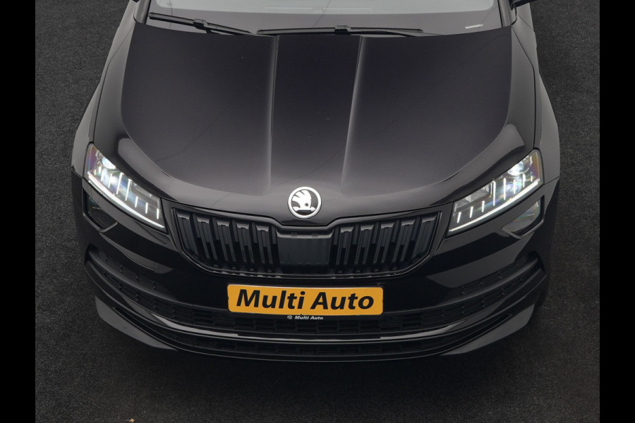 Škoda Karoq 1.5 TSI ACT Sportline 150pk DSG Dealer O.H | Trekhaak Afn. | Panodak | RS Sportstoelen Verwarmd | Adaptive Cruise | Sfeerverlichting | Camera | Apple Carplay | Keyless | Navigatie | DAB | 19" L.M |