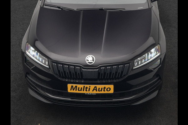 Škoda Karoq 1.5 TSI ACT Sportline 150pk DSG Dealer O.H | Trekhaak Afn. | Panodak | RS Sportstoelen Verwarmd | Adaptive Cruise | Sfeerverlichting | Camera | Apple Carplay | Keyless | Navigatie | DAB | 19" L.M |