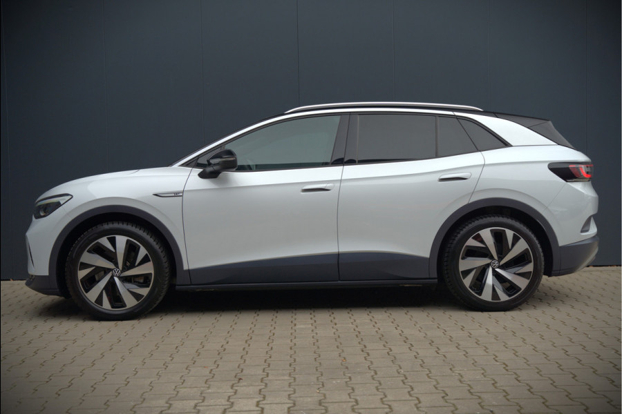 Volkswagen ID.4 First 77 kWh | Stoelverwarming | Stuurverwarming | Trekhaak | Adaptive Cruise Control | Navigatie | Apple Carplay | Keyless | Camera | Parkeersensoren | NAP | BTW | Dealer Onderhouden