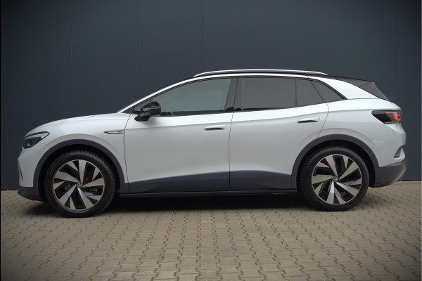 Volkswagen ID.4 First 77 kWh | Stoelverwarming | Stuurverwarming | Trekhaak | Adaptive Cruise Control | Navigatie | Apple Carplay | Keyless | Camera | Parkeersensoren | NAP | BTW | Dealer Onderhouden