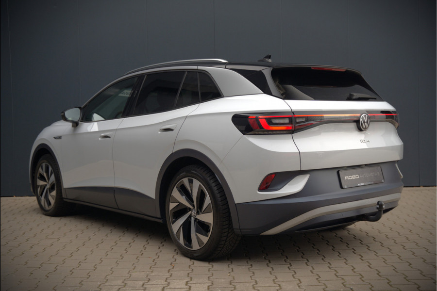 Volkswagen ID.4 First 77 kWh | Stoelverwarming | Stuurverwarming | Trekhaak | Adaptive Cruise Control | Navigatie | Apple Carplay | Keyless | Camera | Parkeersensoren | NAP | BTW | Dealer Onderhouden