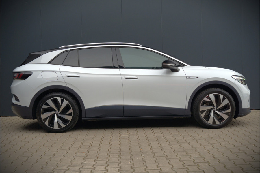 Volkswagen ID.4 First 77 kWh | Stoelverwarming | Stuurverwarming | Trekhaak | Adaptive Cruise Control | Navigatie | Apple Carplay | Keyless | Camera | Parkeersensoren | NAP | BTW | Dealer Onderhouden