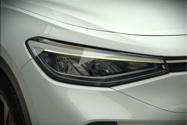 Volkswagen ID.4 First 77 kWh | Stoelverwarming | Stuurverwarming | Trekhaak | Adaptive Cruise Control | Navigatie | Apple Carplay | Keyless | Camera | Parkeersensoren | NAP | BTW | Dealer Onderhouden