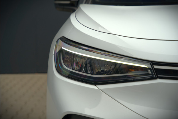 Volkswagen ID.4 First 77 kWh | Stoelverwarming | Stuurverwarming | Trekhaak | Adaptive Cruise Control | Navigatie | Apple Carplay | Keyless | Camera | Parkeersensoren | NAP | BTW | Dealer Onderhouden