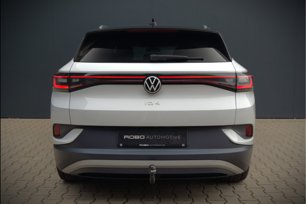 Volkswagen ID.4 First 77 kWh | Stoelverwarming | Stuurverwarming | Trekhaak | Adaptive Cruise Control | Navigatie | Apple Carplay | Keyless | Camera | Parkeersensoren | NAP | BTW | Dealer Onderhouden