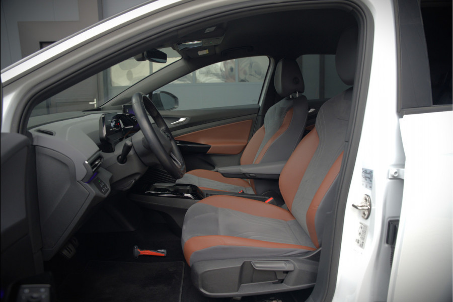Volkswagen ID.4 First 77 kWh | Stoelverwarming | Stuurverwarming | Trekhaak | Adaptive Cruise Control | Navigatie | Apple Carplay | Keyless | Camera | Parkeersensoren | NAP | BTW | Dealer Onderhouden