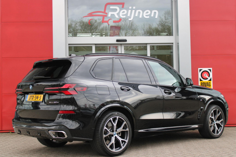 BMW X5 xDrive50e 490PK M-SPORT LAUNCH EDITION | PANORAMA SCHUIF/KANTEL DAK "SKY LOUNGE" | COMFORT STOELEN ELEKTRISCH VERSTELBAAR MET GEHEUGENFUNCTIE EN VERWARMBAAR VOOR EN ACHTER | LEDEREN BEKLEDING BMW INDIVIDUAL ZWART | EDELHOUT INTERIEURLIJSTEN | RIJASSISTENT-SYSTEEM DRIVING ASSISTANT PROFFESIONAL MET O.A. DODEHOEK DETECTIE EN ADAPTIVE CRUISE CONTROL | TRAVEL PAKKET | INNOVATIE-PAKKET: PARKEERASSISTENT-PAKKET PROFESSIONAL/ADAPTIEVE LED KOPLAMPEN/HARMAN/KARDON AUDIO SYSTEM/BMW LIVE PROFESSIONAL/RIJASSISTEN-SYSTEEM BMW GESTURE CONTROL/RIJSTROOK ASSISTENT/RIJSTROOKWISSEL ASSI
