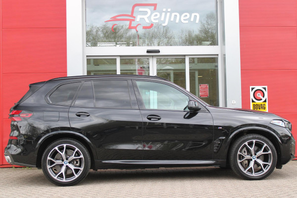 BMW X5 xDrive50e 490PK M-SPORT LAUNCH EDITION | PANORAMA SCHUIF/KANTEL DAK "SKY LOUNGE" | COMFORT STOELEN ELEKTRISCH VERSTELBAAR MET GEHEUGENFUNCTIE EN VERWARMBAAR VOOR EN ACHTER | LEDEREN BEKLEDING BMW INDIVIDUAL ZWART | EDELHOUT INTERIEURLIJSTEN | RIJASSISTENT-SYSTEEM DRIVING ASSISTANT PROFFESIONAL MET O.A. DODEHOEK DETECTIE EN ADAPTIVE CRUISE CONTROL | TRAVEL PAKKET | INNOVATIE-PAKKET: PARKEERASSISTENT-PAKKET PROFESSIONAL/ADAPTIEVE LED KOPLAMPEN/HARMAN/KARDON AUDIO SYSTEM/BMW LIVE PROFESSIONAL/RIJASSISTEN-SYSTEEM BMW GESTURE CONTROL/RIJSTROOK ASSISTENT/RIJSTROOKWISSEL ASSI