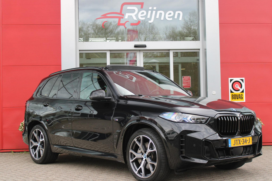 BMW X5 xDrive50e 490PK M-SPORT LAUNCH EDITION | PANORAMA SCHUIF/KANTEL DAK "SKY LOUNGE" | COMFORT STOELEN ELEKTRISCH VERSTELBAAR MET GEHEUGENFUNCTIE EN VERWARMBAAR VOOR EN ACHTER | LEDEREN BEKLEDING BMW INDIVIDUAL ZWART | EDELHOUT INTERIEURLIJSTEN | RIJASSISTENT-SYSTEEM DRIVING ASSISTANT PROFFESIONAL MET O.A. DODEHOEK DETECTIE EN ADAPTIVE CRUISE CONTROL | TRAVEL PAKKET | INNOVATIE-PAKKET: PARKEERASSISTENT-PAKKET PROFESSIONAL/ADAPTIEVE LED KOPLAMPEN/HARMAN/KARDON AUDIO SYSTEM/BMW LIVE PROFESSIONAL/RIJASSISTEN-SYSTEEM BMW GESTURE CONTROL/RIJSTROOK ASSISTENT/RIJSTROOKWISSEL ASSI