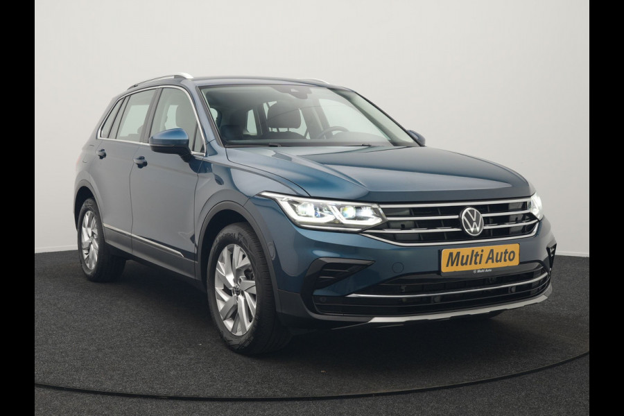 Volkswagen Tiguan 1.4 TSI eHybrid Elegance PHEV 245pk Dealer O.H. | Trekhaak Af Fabriek | Adaptive Cruise | IQ Light | Camera | Lederen Comfortzetels Memory & Verwarmd | Sfeerverlichting | Apple Carplay | Stuur Verwarmd | Navigatie | DAB | Plug In Hybrid |