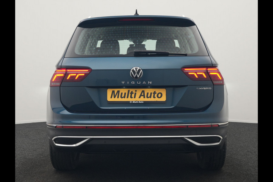 Volkswagen Tiguan 1.4 TSI eHybrid Elegance PHEV 245pk Dealer O.H. | Trekhaak Af Fabriek | Adaptive Cruise | IQ Light | Camera | Lederen Comfortzetels Memory & Verwarmd | Sfeerverlichting | Apple Carplay | Stuur Verwarmd | Navigatie | DAB | Plug In Hybrid |