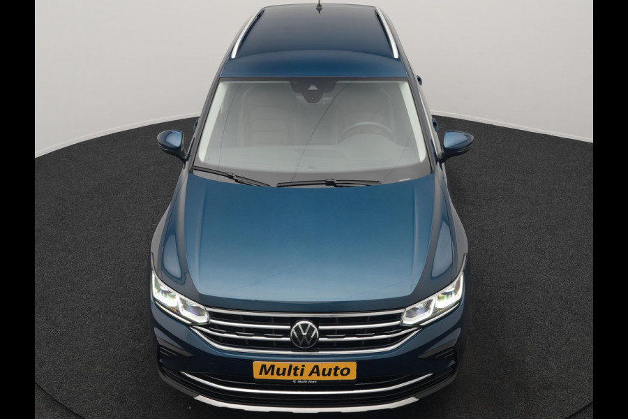 Volkswagen Tiguan 1.4 TSI eHybrid Elegance PHEV 245pk Dealer O.H. | Trekhaak Af Fabriek | Adaptive Cruise | IQ Light | Camera | Lederen Comfortzetels Memory & Verwarmd | Sfeerverlichting | Apple Carplay | Stuur Verwarmd | Navigatie | DAB | Plug In Hybrid |