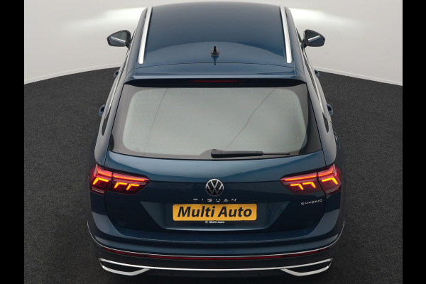Volkswagen Tiguan 1.4 TSI eHybrid Elegance PHEV 245pk Dealer O.H. | Trekhaak Af Fabriek | Adaptive Cruise | IQ Light | Camera | Lederen Comfortzetels Memory & Verwarmd | Sfeerverlichting | Apple Carplay | Stuur Verwarmd | Navigatie | DAB | Plug In Hybrid |