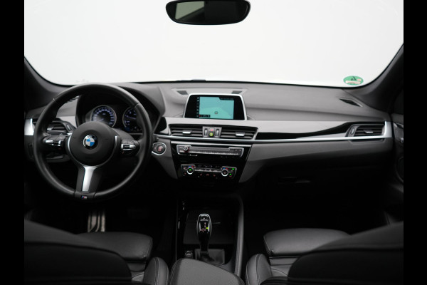 BMW X1 sDrive18i M Sport 141pk | Trekhaak Afn. | Camera | Lederen Sportstoelen Verwarmd | Navigatie | Cruise Control | LED Koplampen | 18"L.M |