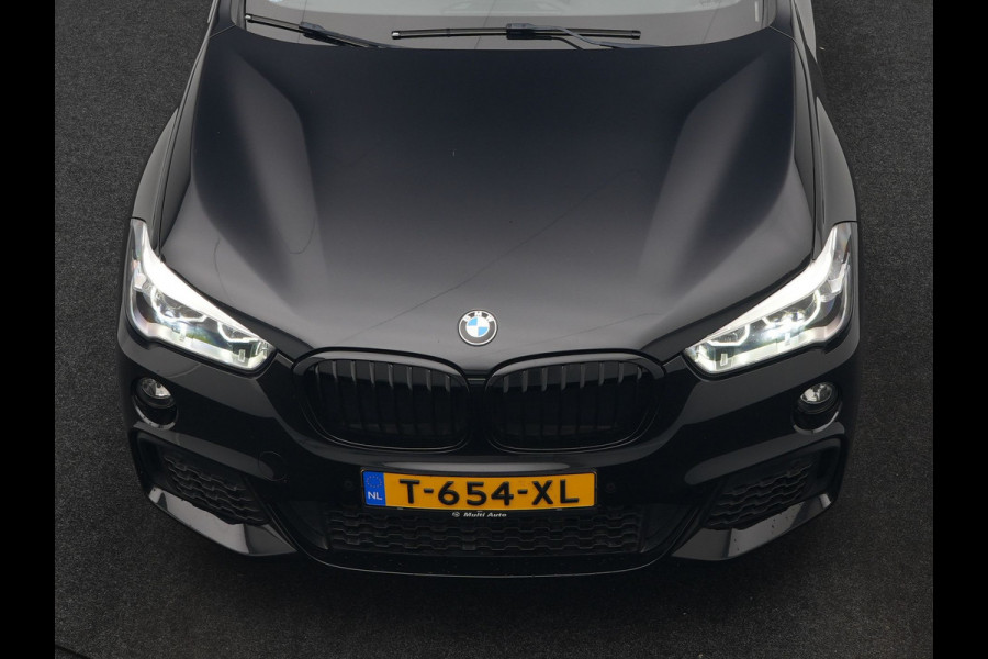 BMW X1 sDrive18i M Sport 141pk | Trekhaak Afn. | Camera | Lederen Sportstoelen Verwarmd | Navigatie | Cruise Control | LED Koplampen | 18"L.M |