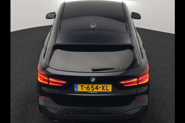 BMW X1 sDrive18i M Sport 141pk | Trekhaak Afn. | Camera | Lederen Sportstoelen Verwarmd | Navigatie | Cruise Control | LED Koplampen | 18"L.M |