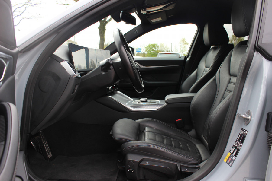 BMW i4 eDrive40 High Executive 84 kWh / SoH 93,5% / Trekhaak / 360Camera / Head-up / Leder / 19'' / Navigatie / Stoelverwarming / DAB / Cruise Control