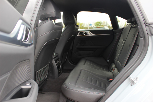 BMW i4 eDrive40 High Executive 84 kWh / SoH 93,5% / Trekhaak / 360Camera / Head-up / Leder / 19'' / Navigatie / Stoelverwarming / DAB / Cruise Control