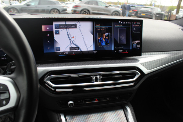 BMW i4 eDrive40 High Executive 84 kWh / SoH 93,5% / Trekhaak / 360Camera / Head-up / Leder / 19'' / Navigatie / Stoelverwarming / DAB / Cruise Control