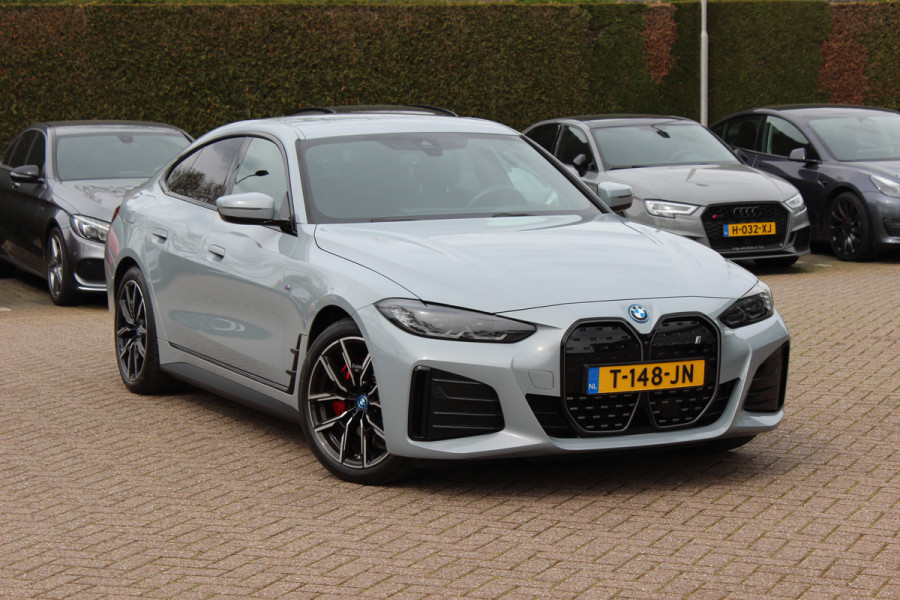 BMW i4 eDrive40 High Executive 84 kWh / SoH 93,5% / Trekhaak / 360Camera / Head-up / Leder / 19'' / Navigatie / Stoelverwarming / DAB / Cruise Control