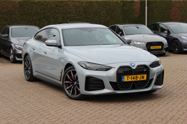 BMW i4 eDrive40 High Executive 84 kWh / SoH 93,5% / Trekhaak / 360Camera / Head-up / Leder / 19'' / Navigatie / Stoelverwarming / DAB / Cruise Control