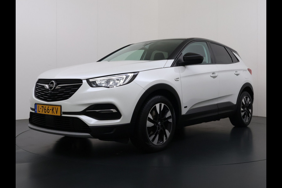 Opel Grandland X 1.6T 225pk PHEV Hybride AUT-8. Navi 360°Camera 1/2 Leer Apple Carplay Android Two-Tone AGR-Comfort Stoelen StoelverwarmingAuto E Elek.Achterklep Led Privacy Glas Lmv Isofix DAB Bluetooth Lane Assist Regen-Lichtsensor Keyless 1e Eigenaar Dealeronderhouden Origineel Nederlandse Auto € 46.000 nieuw!