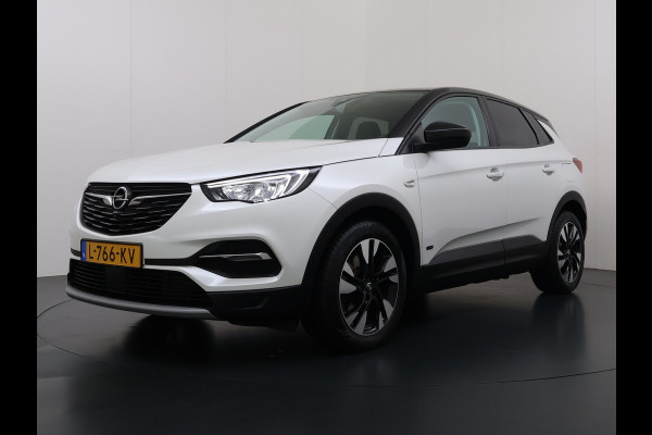 Opel Grandland X 1.6T 225pk PHEV Hybride AUT-8. Navi 360°Camera 1/2 Leer Apple Carplay Android Two-Tone AGR-Comfort Stoelen StoelverwarmingAuto E Elek.Achterklep Led Privacy Glas Lmv Isofix DAB Bluetooth Lane Assist Regen-Lichtsensor Keyless 1e Eigenaar Dealeronderhouden Origineel Nederlandse Auto € 46.000 nieuw!