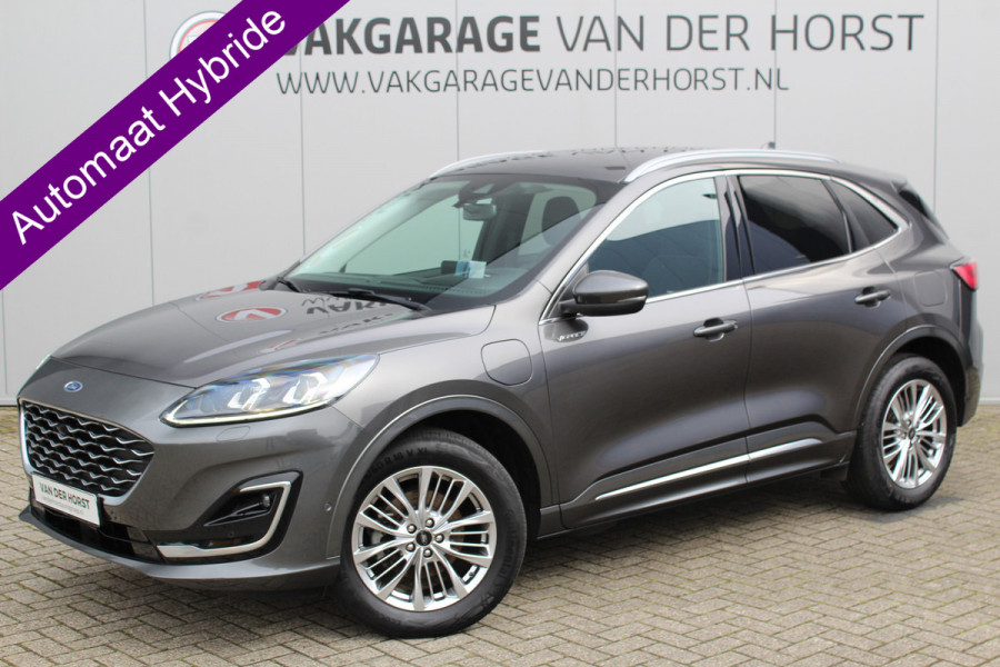 Ford Kuga 2.5-225pk PHEV 'Vignale' Plug-in Hybrid Automaat. Luxe hybride rijden voor een reëel bedrag ! Trekhaak, Adaptieve Cruise Cntrl, Climate Cntrl, Side- en lane assist, Head-Up display, Winter Pack, Driver Ass. Pack, Camera, Elektr. achterklep etc.