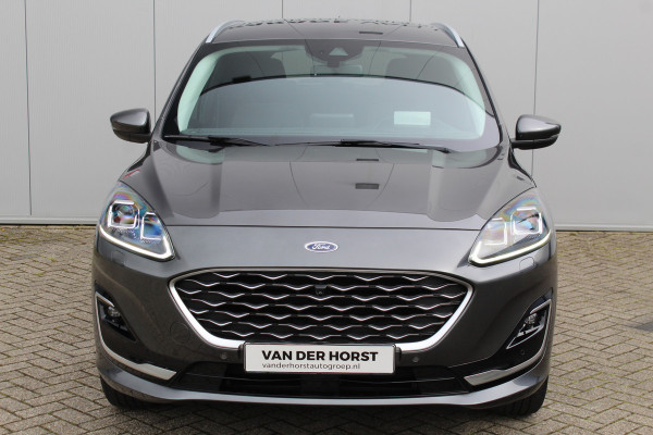 Ford Kuga 2.5-225pk PHEV 'Vignale' Plug-in Hybrid Automaat. Luxe hybride rijden voor een reëel bedrag ! Trekhaak, Adaptieve Cruise Cntrl, Climate Cntrl, Side- en lane assist, Head-Up display, Winter Pack, Driver Ass. Pack, Camera, Elektr. achterklep etc.