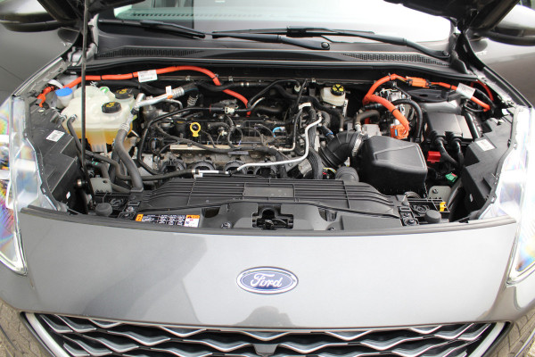 Ford Kuga 2.5-225pk PHEV 'Vignale' Plug-in Hybrid Automaat. Luxe hybride rijden voor een reëel bedrag ! Trekhaak, Adaptieve Cruise Cntrl, Climate Cntrl, Side- en lane assist, Head-Up display, Winter Pack, Driver Ass. Pack, Camera, Elektr. achterklep etc.