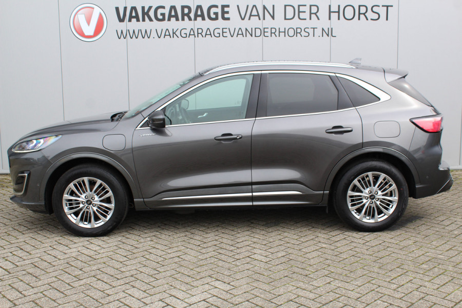 Ford Kuga 2.5-225pk PHEV 'Vignale' Plug-in Hybrid Automaat. Luxe hybride rijden voor een reëel bedrag ! Trekhaak, Adaptieve Cruise Cntrl, Climate Cntrl, Side- en lane assist, Head-Up display, Winter Pack, Driver Ass. Pack, Camera, Elektr. achterklep etc.