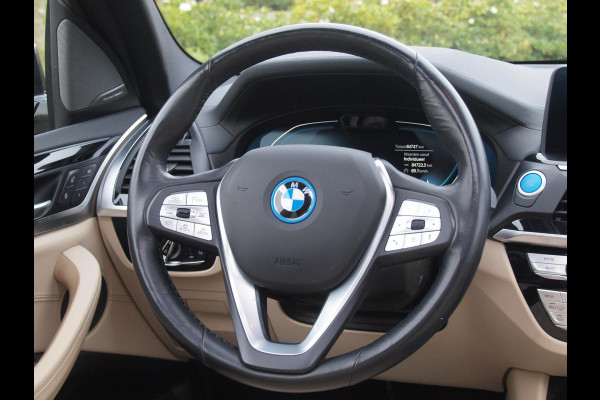 BMW iX3 High Executive 80 kWh | Panoramadak | Trekhaak | Head-Up Display | 360 Camera | Harman Kardon | Sfeerverlichting |