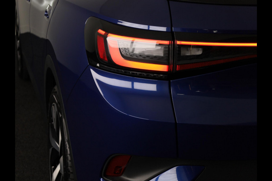 Volkswagen ID.4 First 77 kWh 204pk SoH 88,9 | Camera| Parkeersensoren | Sfeerverlichting | Navigatie | Stoelverwarming| Stuurverwarming | Zwenkbare Trekhaak |