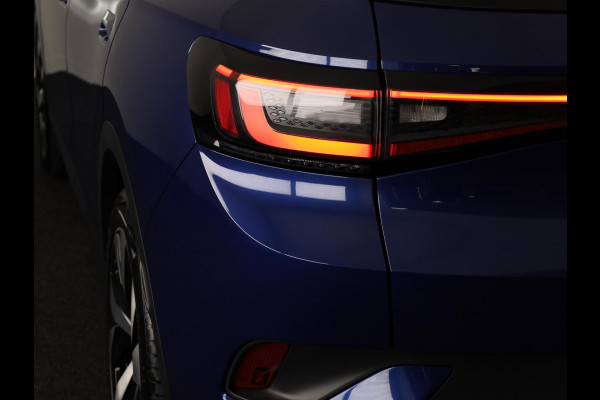 Volkswagen ID.4 First 77 kWh 204pk SoH 88,9 | Camera| Parkeersensoren | Sfeerverlichting | Navigatie | Stoelverwarming| Stuurverwarming | Zwenkbare Trekhaak |