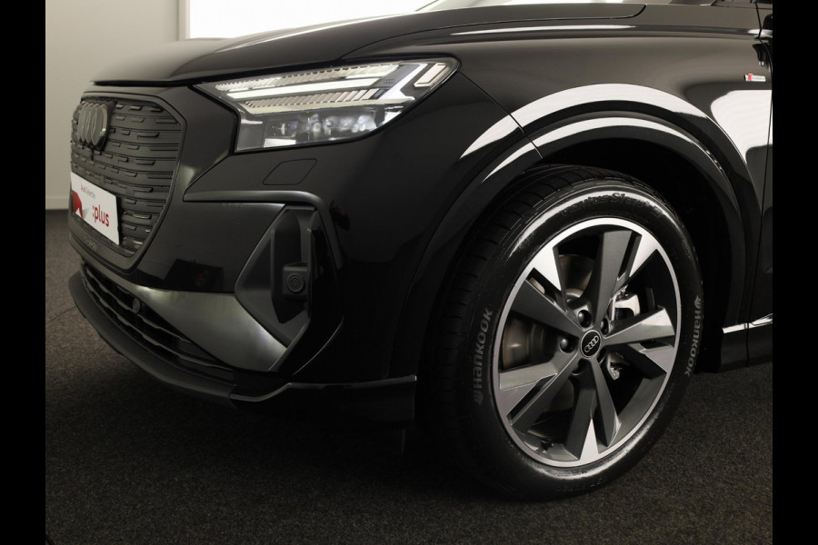 Audi Q4 e-tron 45 quattro S edition Competition 82 kWh 286pk | Assistentiepakket plus | Ambiente verlichting | Optiekpakket zwart plus | Privacy glas |