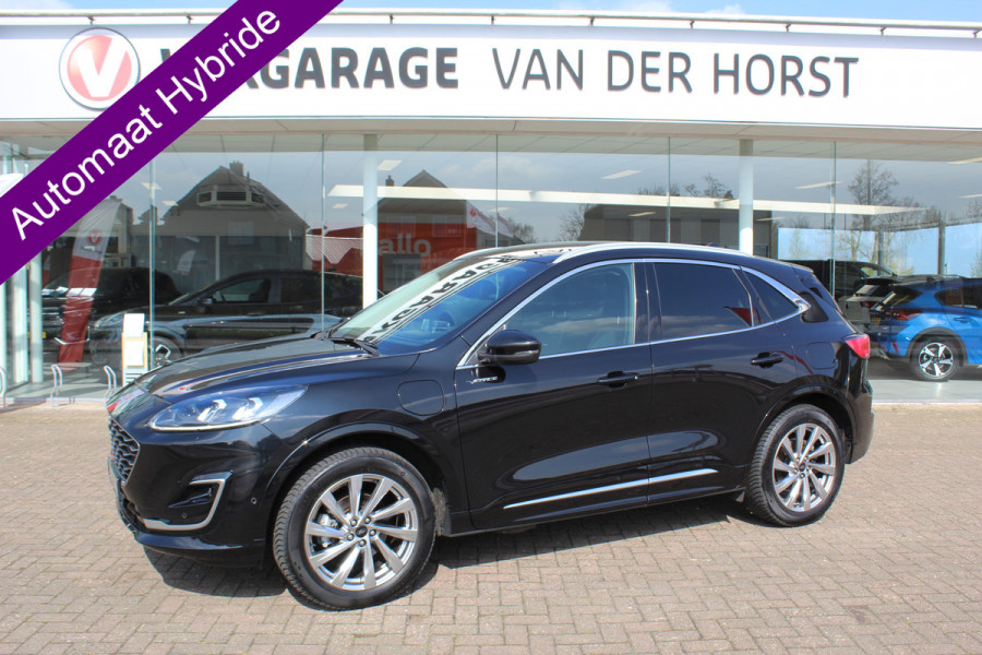 Ford Kuga 2.5-225pk PHEV 'Vignale' Plug-in Hybrid Automaat. Luxe hybride rijden voor een reëel bedrag ! Adaptieve Cruise Control, Climate Control, Stoel-, stuur-, voorraam- en achterbankverwarming, Side- en lane assist, Camera, Head-up display etc.
